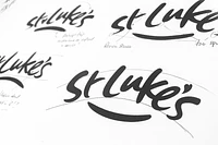 st luke's logo design process drawn with pencil