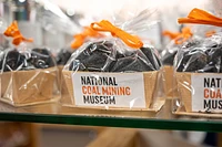national coal mining musuem logo on wrapped bag in gift shop