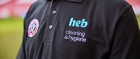 Heb cleaning and hygience logo on SUFC staff shirt